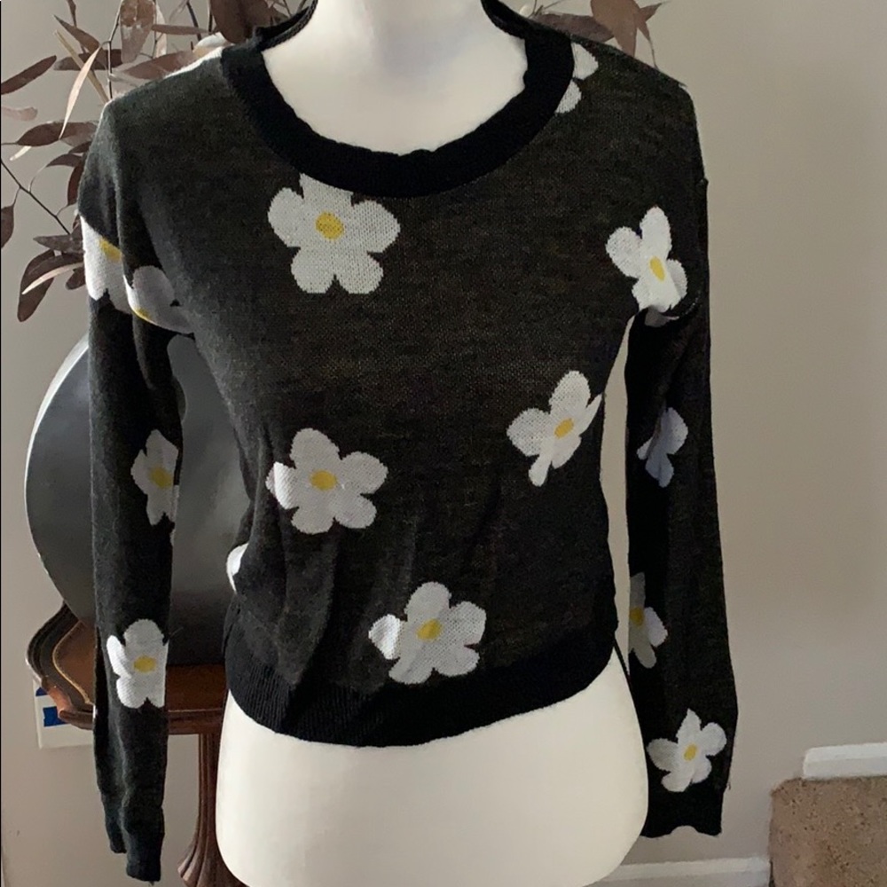 Used, shirt with white and yellow flowers.